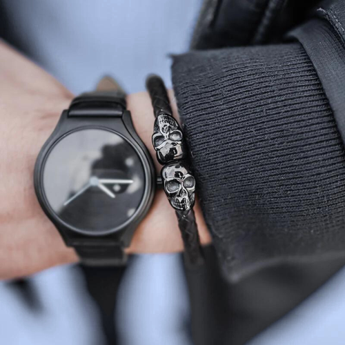 Man carrying the black braided biker bracelet with his two black stainless steel head heads.