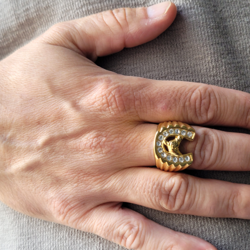 Men's signet ring, golden steel, gold...