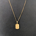 Demonstration of the elegance of the Allah Golden Military Plate Pendant on a male chest.