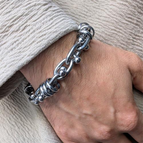 Stainless steel stainless steel bracelet with interstered ring links, secure ring clasp