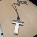 Cross man pendant: a pendant combining religion and style
