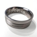 Stainless steel wedding ring ring displaying a custom laser engraving