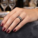 Beautiful black alliance ring and crystals worn to the annular woman to symbolize a wedding or commitment