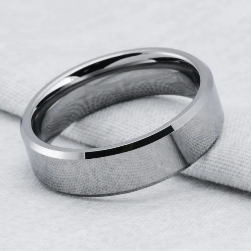 Focus on the smooth and polished inner side of this tungsten ring ready to accommodate a personalized laser engraving