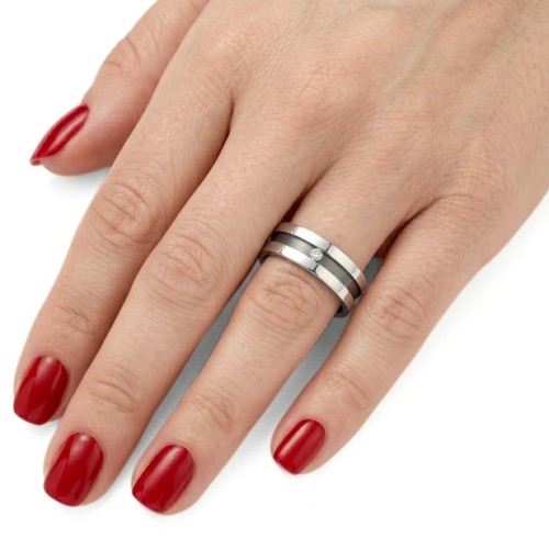 Bicolor and black silver and black steel engagement ring set zirconium worn by a woman with a modern style