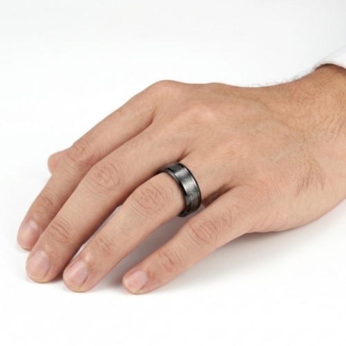 Black steel ring with meteorite with the annular of a man for a modern, mysterious and cosmic style