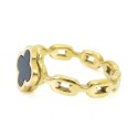 Detailed view of the ring showing the finery of the Golden Marine Mesh and the Central Black Clover Crimping