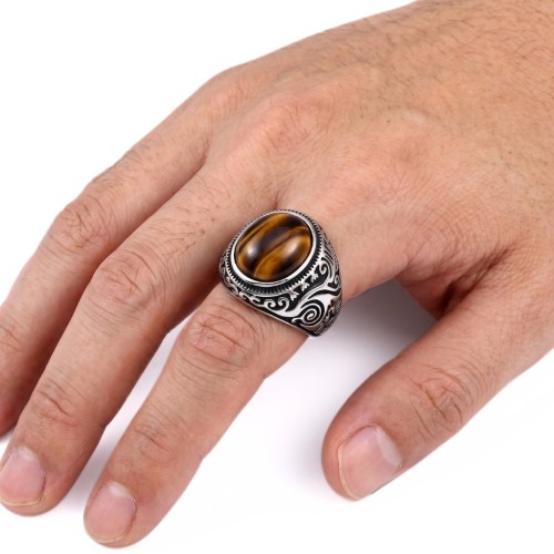 Knight Tribal Steel Protective In Tiger Eye Waled by a Man For Affirmed and Timeless Style