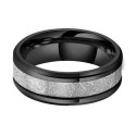 Other detailed view of the ring showing the contrast between the black metal and the cosmic texture of the imitation meteorite