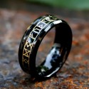 Detailed view of the ring showing the contrast between black steel and the brilliance of golden mythological runes