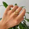 Romantisches Herz romantisches goldenes offenes Herz fingeriert, mit einem Hauch von Brillanz zu einem weiblichen Outfit bringt.