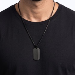 Black minimalist man pendant with grooves highlighting the contrast of the shiny steel strip. 2