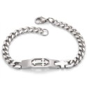 Gourmet for man in Cuban mesh stainless steel, with an openwork central plate forming a trafted Latin cross.