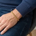 Man with Golden Stainless Steel Bracelet with Jaseron Rolo Mesh of 6 mm on the wrist, with engraving clasp