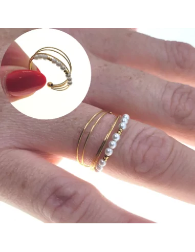 Anello donna aperto in acciaio dorato con anelli in oro fine raccolti perle bianche consumate