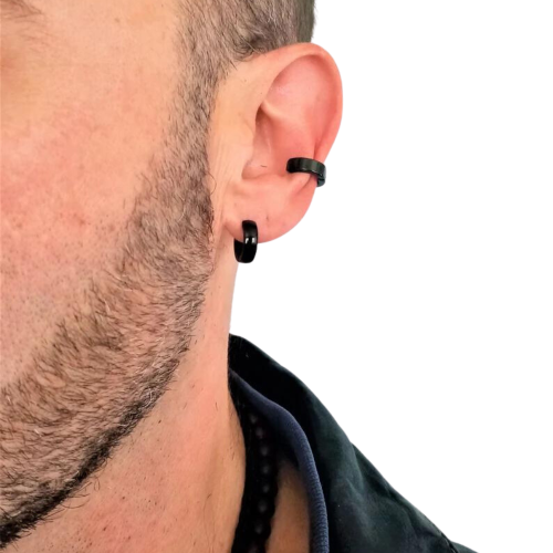 False pair of black steel earrings without hole worn by a man