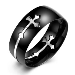 Anello anti-stress da uomo in acciaio nero con croce medievale argento rimovibile su sfondo con texture.