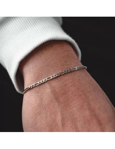 Steel chain bracelet with silver figaro mesh 20cm width 3mm worn by a man