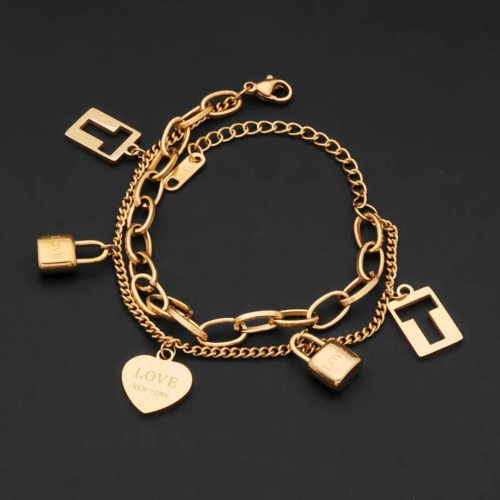 Women's bracelet gold-gold steel with double chain heart 5 charms on black background