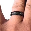 Ring ring steel plated black heartbeat couple worn by a man