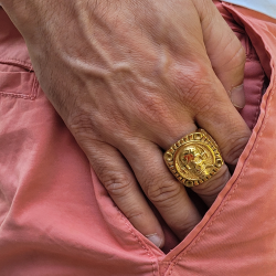 Big modern and very wide ring for men in golden steel with an imposing head of death smoking a cigar in relief 2