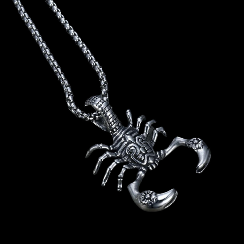 Men's stainless steel tribal scorpion pendant and chain on black background