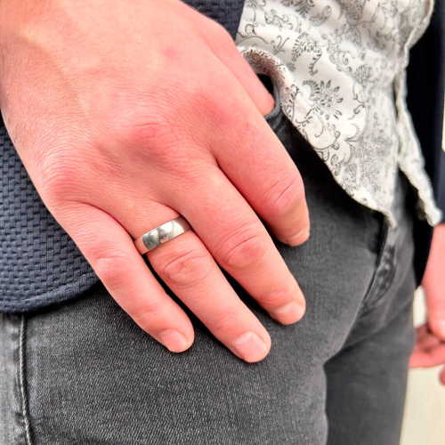 Traditional steel wedding band ring 6mm worn by a man 2
