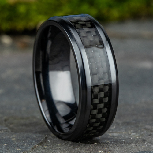 Men's black stainless steel ring and carbon central band shown