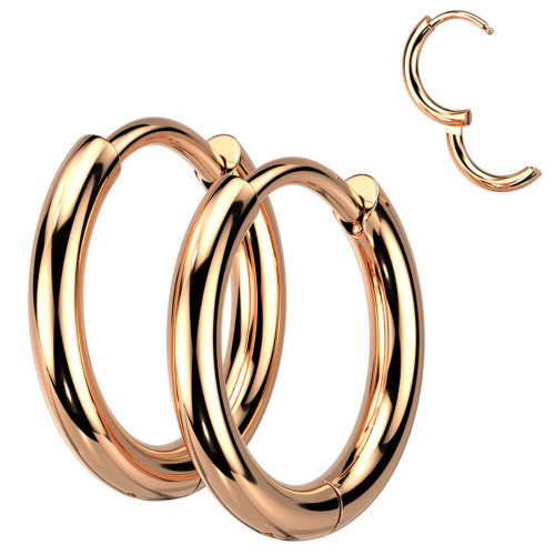 Fine women's earrings in copper-colored steel, chic creole with clips, close-up view