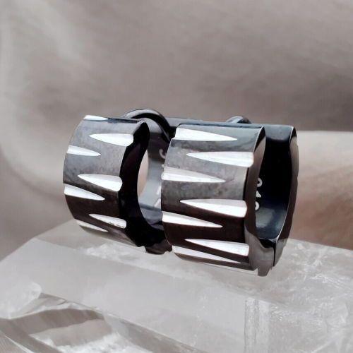 Pair of large striated black plated steel earrings for men and women presented