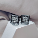 Pair of men's black steel square zirconium hip hop earrings presented