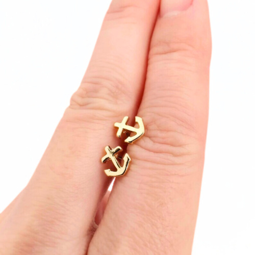 Pendientes para mujer, hombre, acero fino dorado, forma de ancla marina en una mano