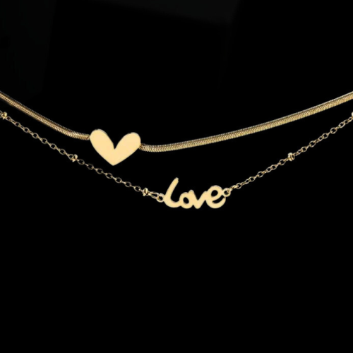 Bracelet ankle chain woman gold steel with fine gold heart love background black
