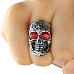 Bague homme acier tête de mort yeux pierre rouge santa muerte bouddha