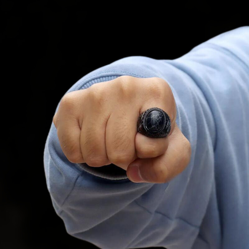 Spiral stainless stainless steel signet ring with a man worn by a man