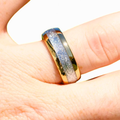 Marriage ring in steel or fine incrustation meteorite worn by a man